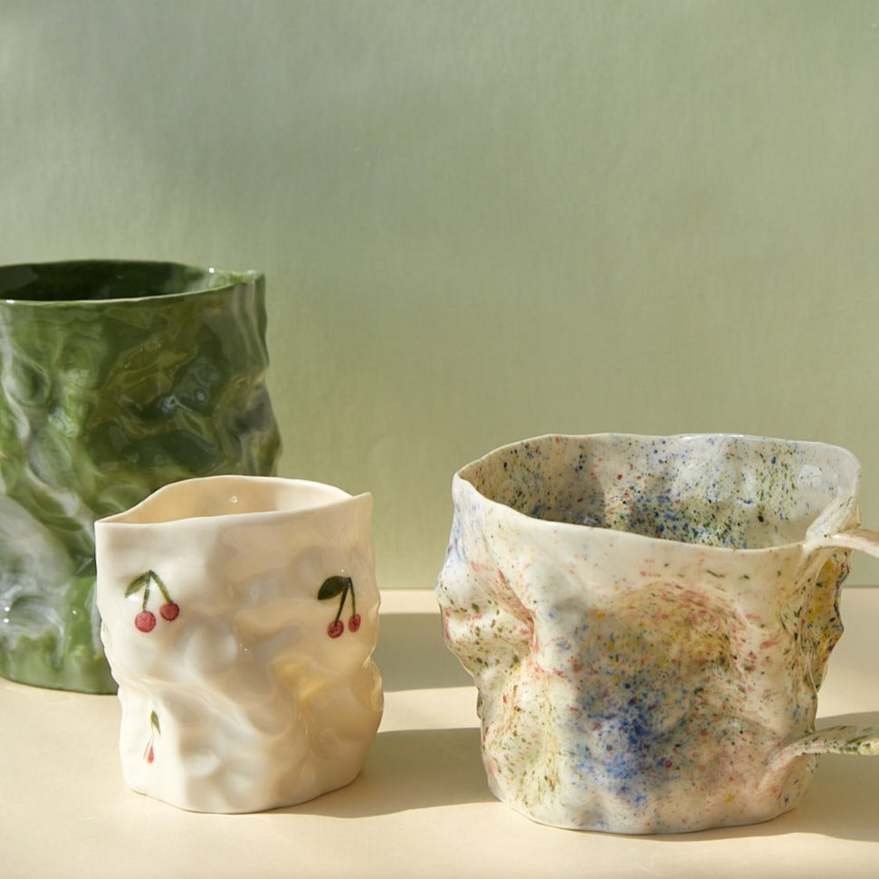 Krøllet Mælkekande