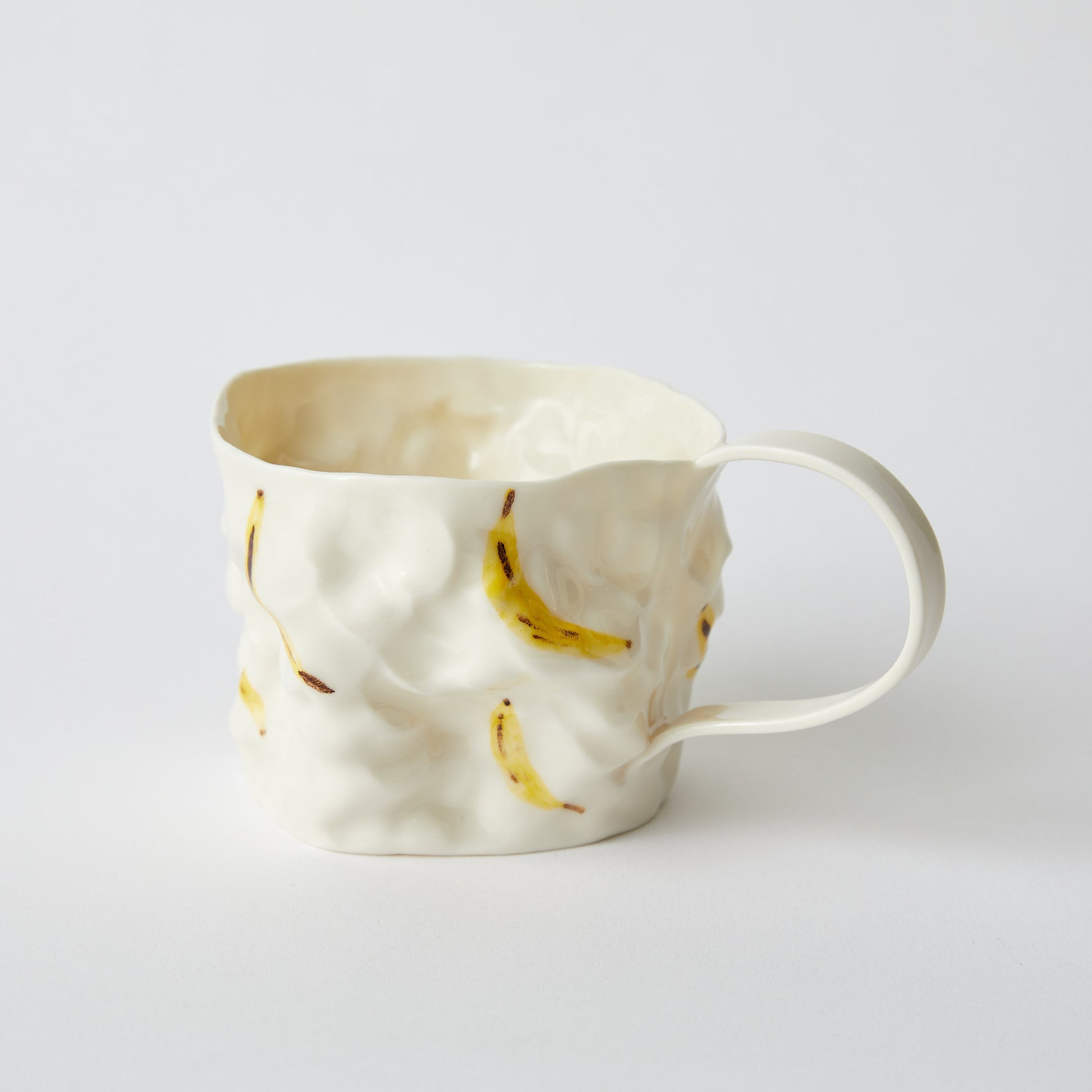 Krøllet Banan Kop